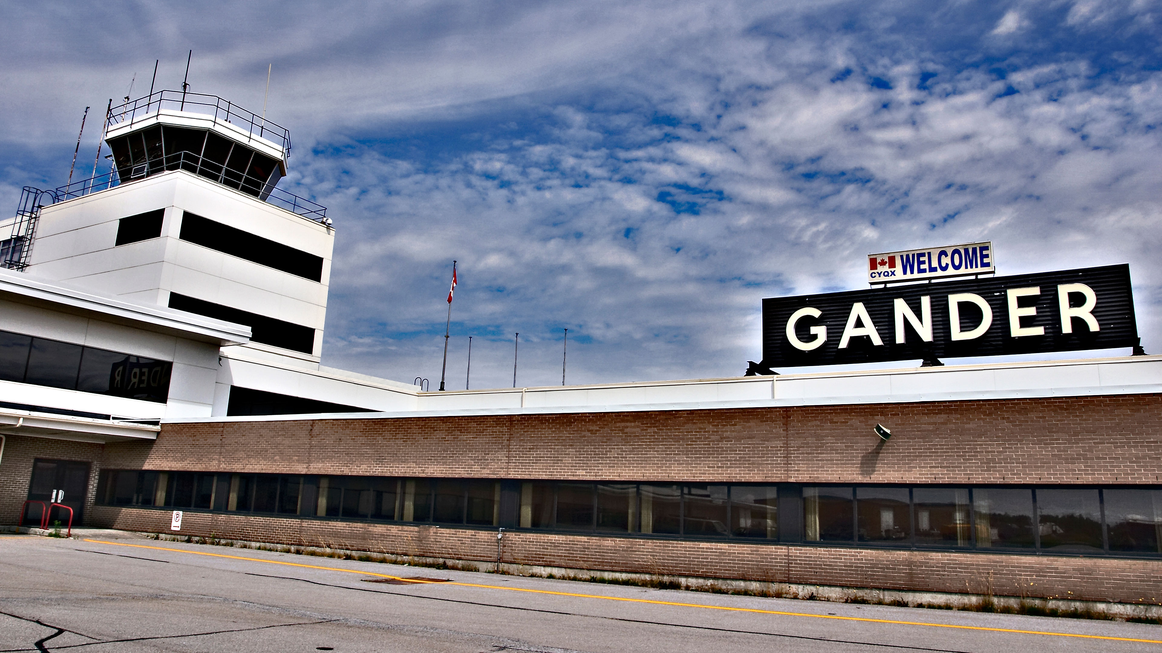 airport with mid-century lettering and blue sky