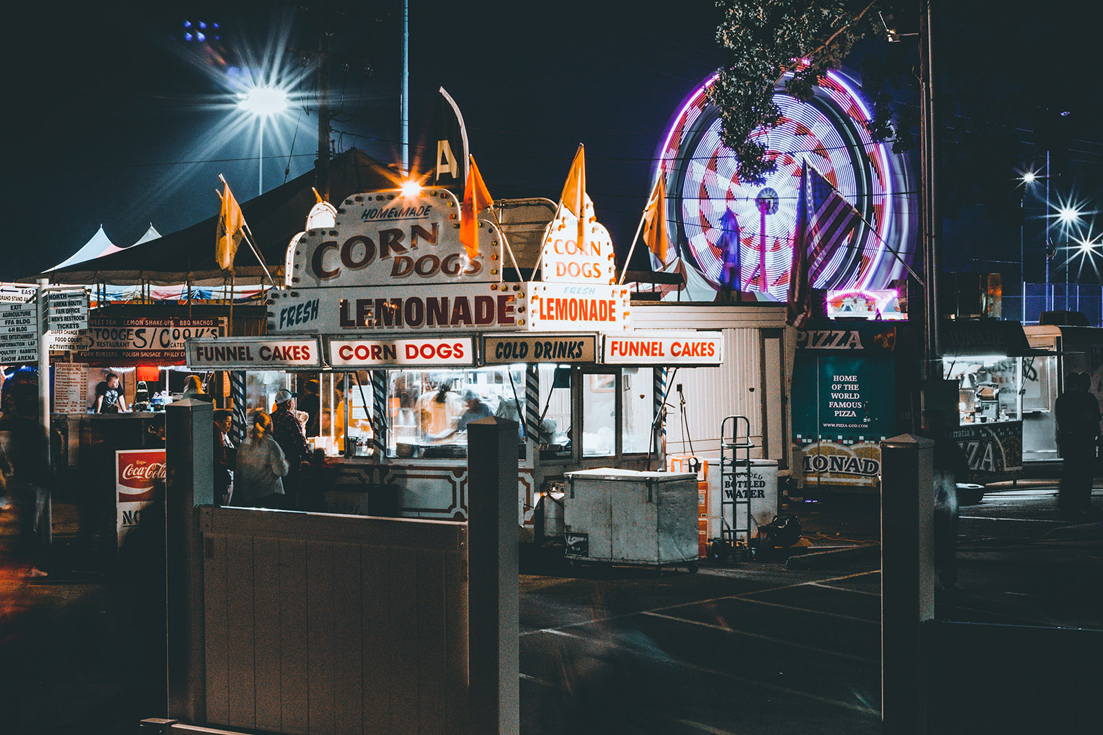 neon-lit food truck at night