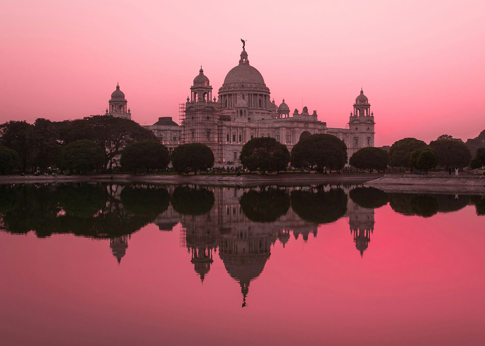 building in kolkata, india, under a pink sky
