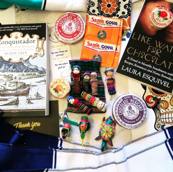 box filled with book and related objects