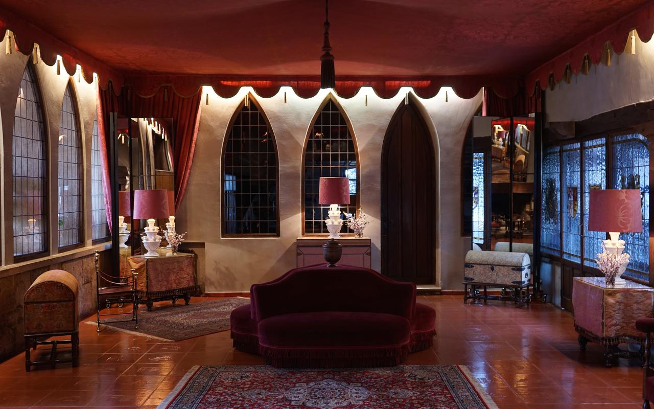  velvet couch in hotel lobby at hotel landa in burgos, spain