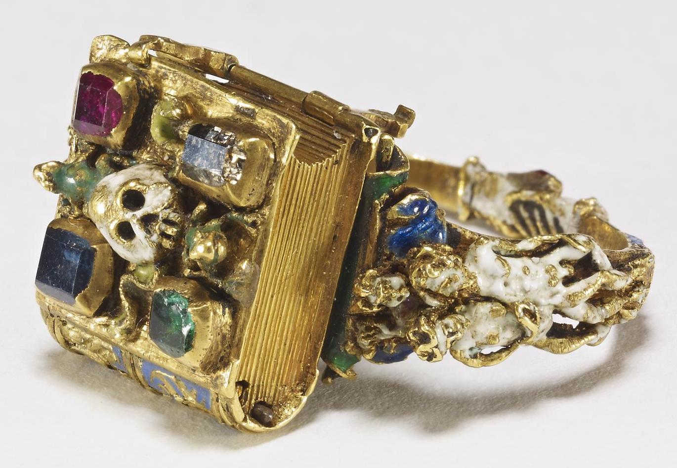 tiny book ring with gemstones