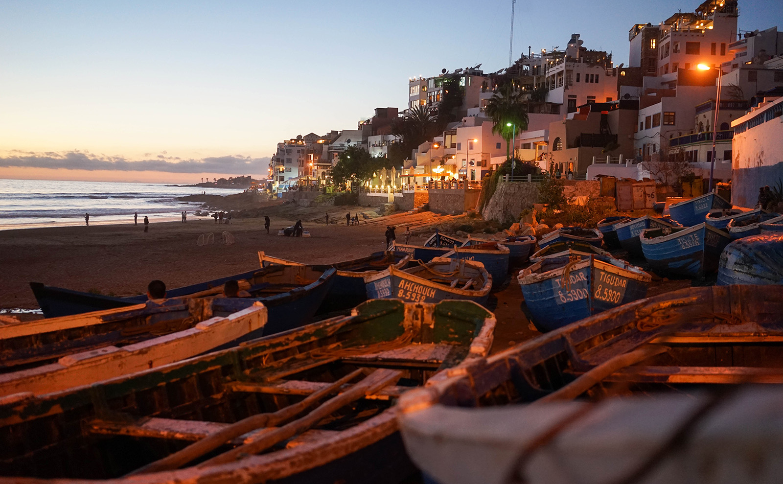 boats on a beach in morocco