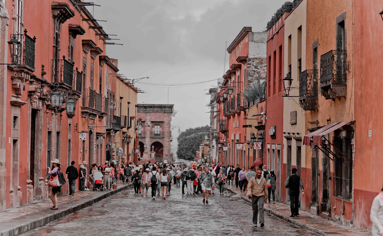 pink buildings on a street in San Miguel de Allende, Mexico