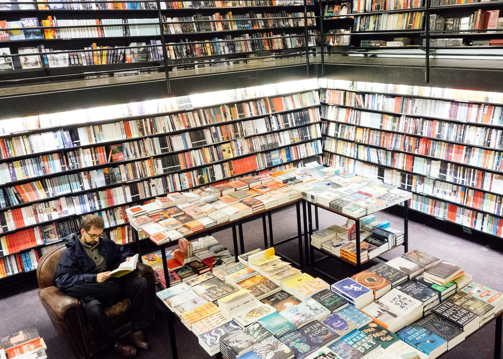 english language section of the store with easy chairs