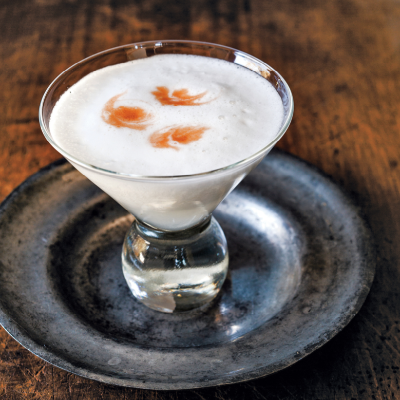 pisco sour in a cocktail glass