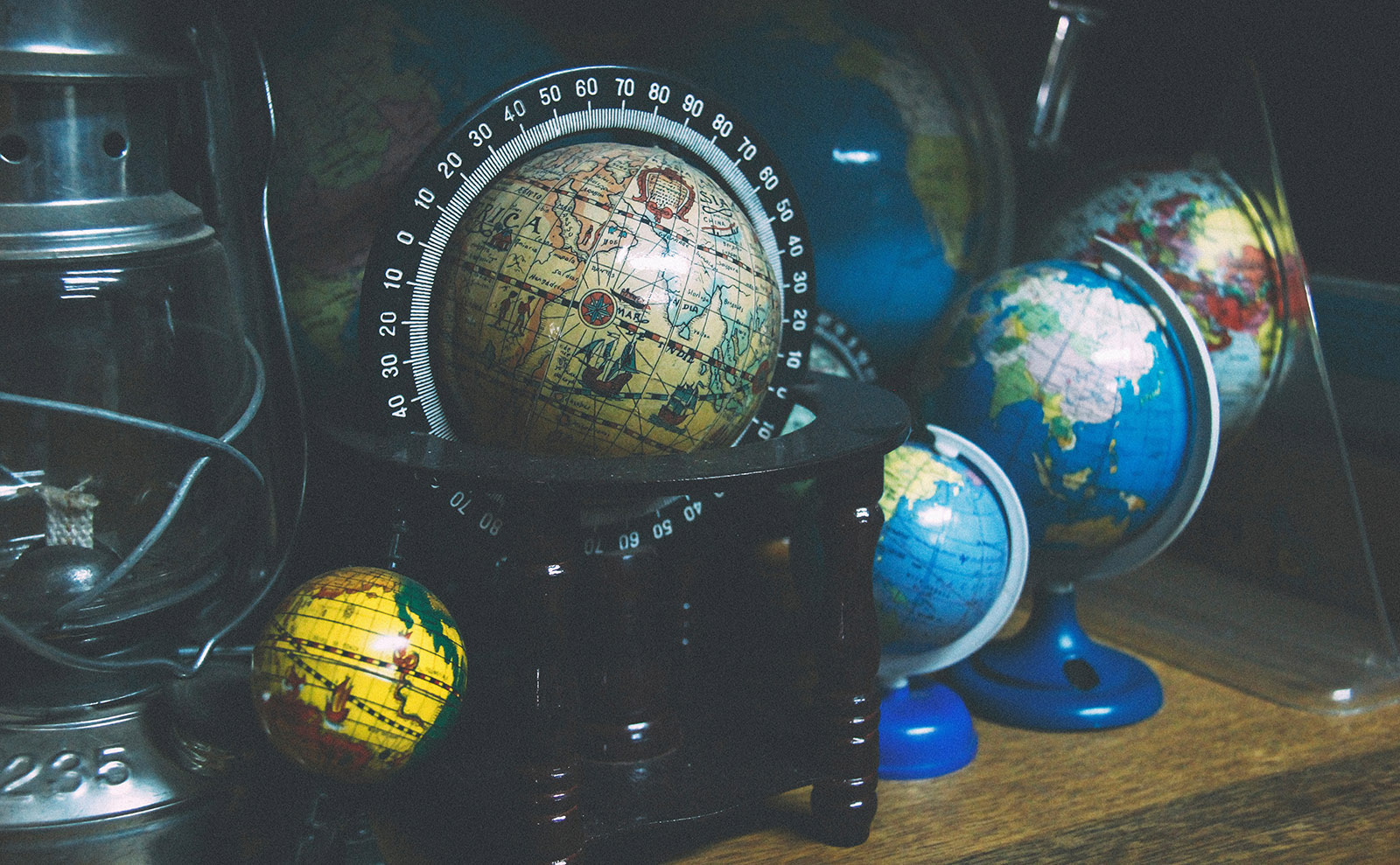 colorful globes lined up on a table