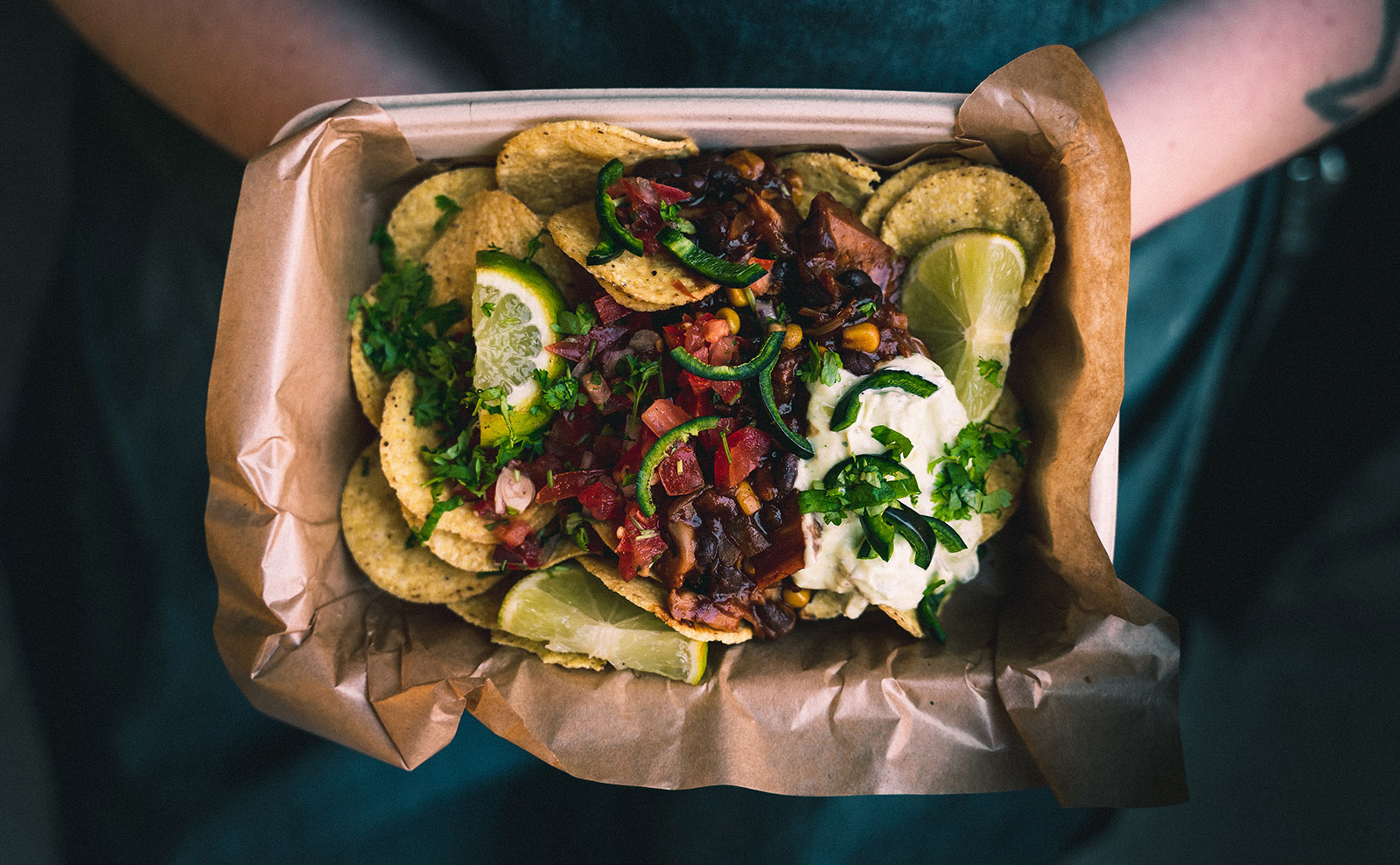 paper basket of nachos